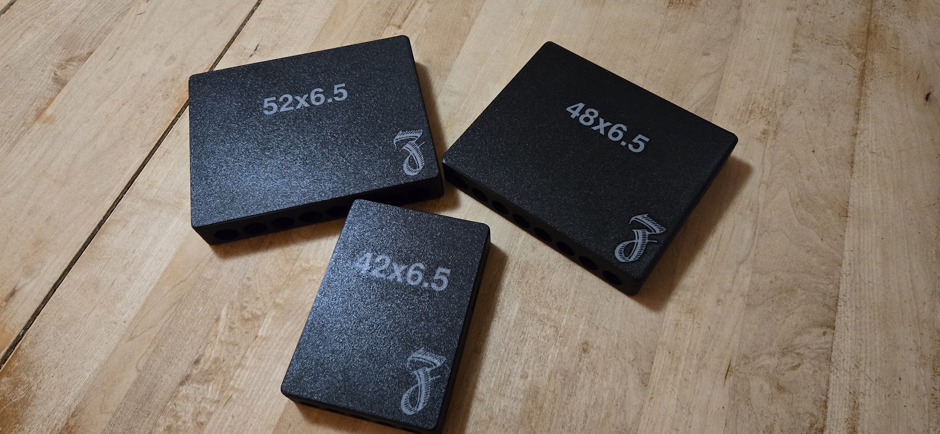 Cigar molds engraved with the Z logo and 52x6.5, 48x6.5, and 42x6.5 sizes